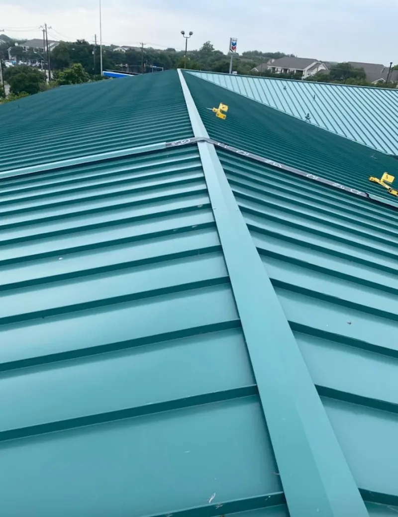 Green commercial metal roof ridge and valley for Metal Roof Repair in Mead